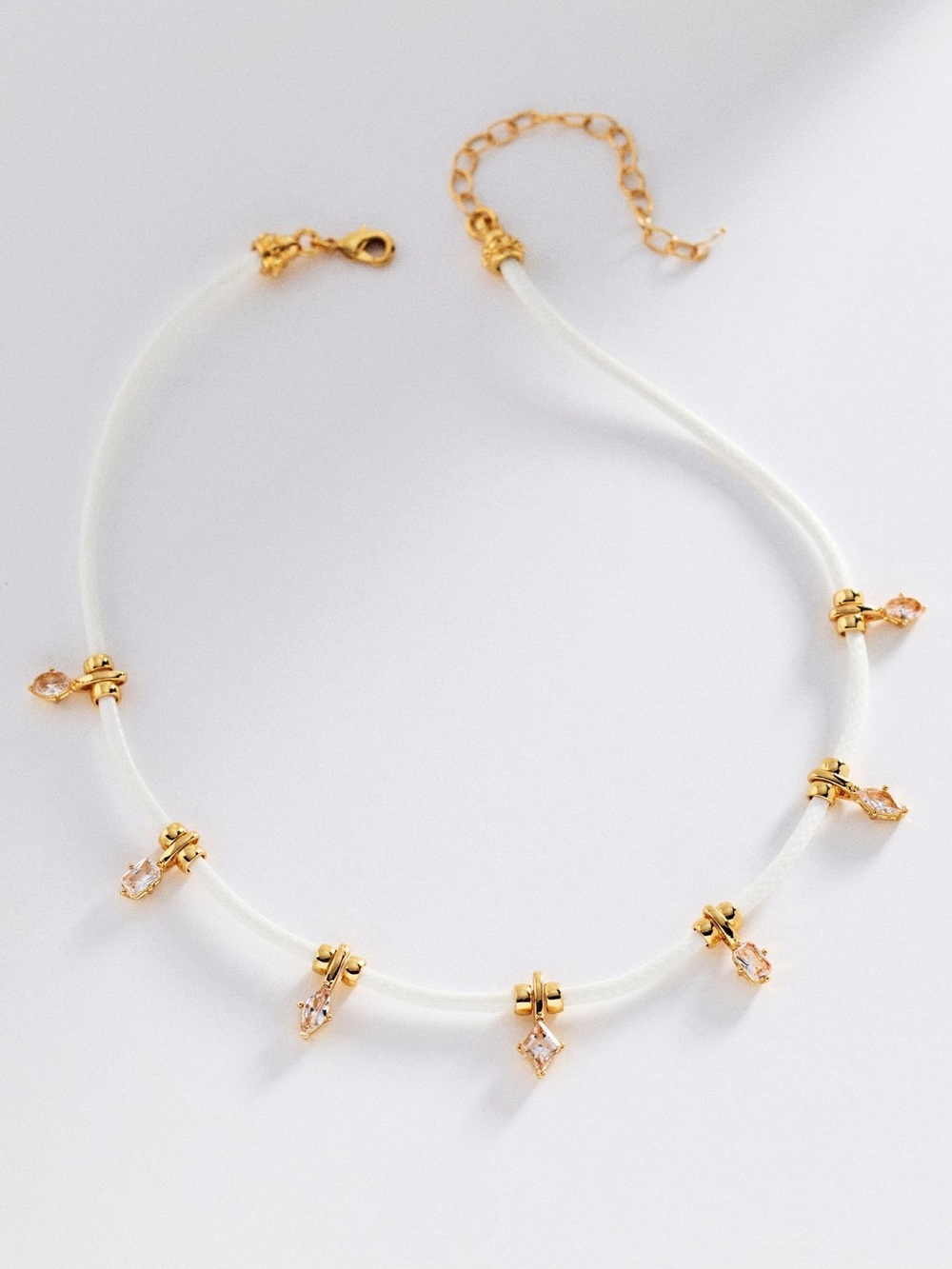 Anthropologie White Cord Necklace Gold and Crystal Charm Drops NEW